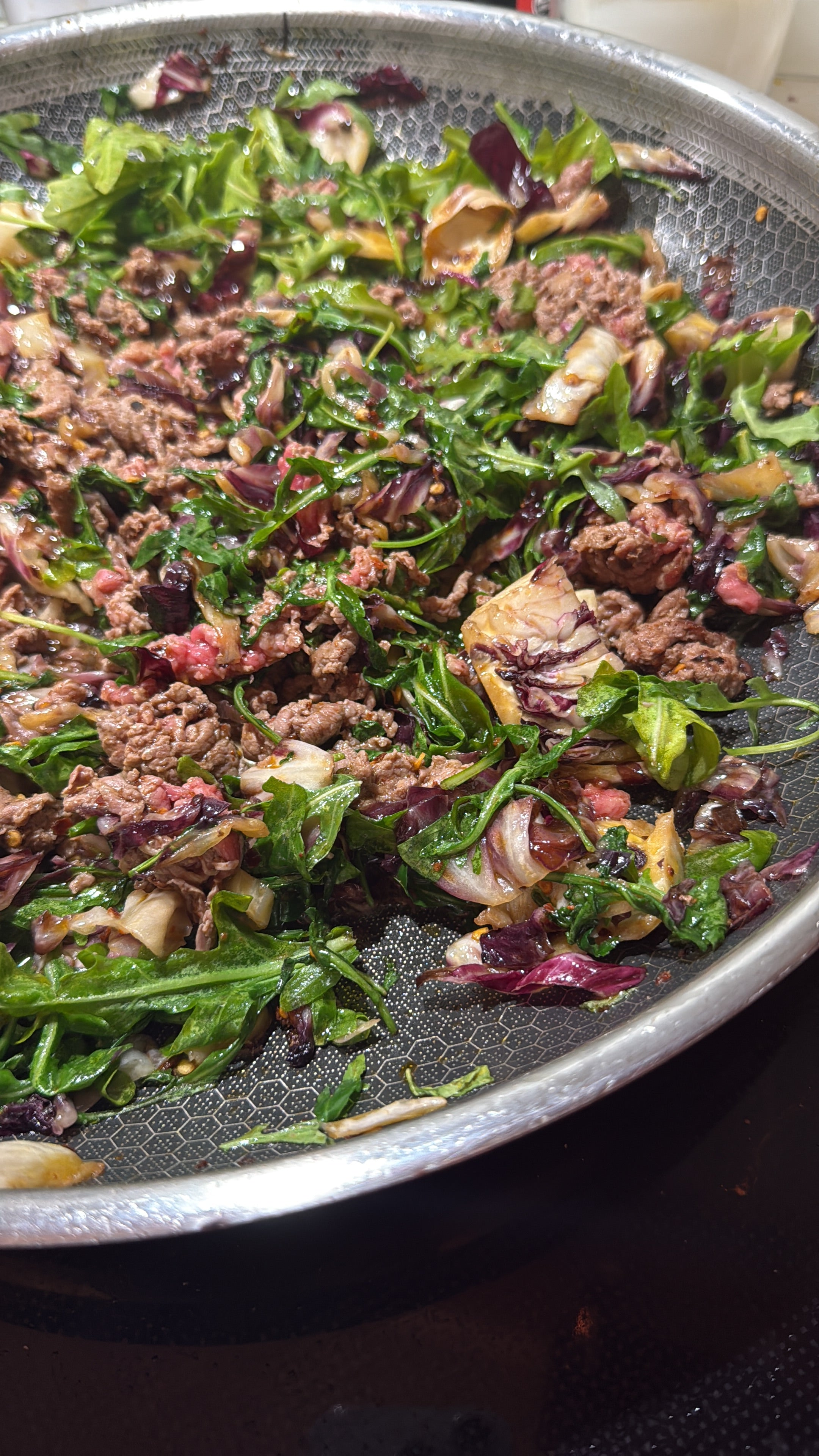 Tender shaved beef served with fresh arugula and crisp radicchio. A perfectly balanced dish with bold flavors and a clean, refined finish.